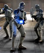 3 Clone Troopers in battle.