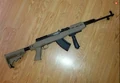 Tapco SKS with fore grip and 20 round magazine.