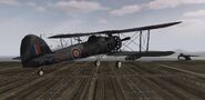 Rear view of a Swordfish bomber on deck of an Attacker-class escort carrier on 4205-Operation Ironclad