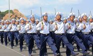 Vietnam People's Navy sailors in full uniform during a parade.