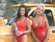 Baywatch - February 4, 1995 - A12 - Caroline (Yasmine Bleeth) And C.J. (Pamela Anderson) In Their Red Lifeguard Bathing Suits