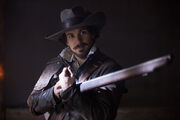 Aramis with musket