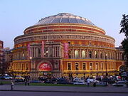 In his lyrics, Lennon mentions the Royal Albert Hall, a symbol of Victorian-era London and a concert venue usually associated with classical music performances.
