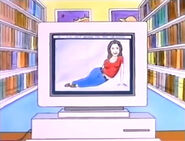 Stewart finds a picture of a woman. "Well, that's a start."