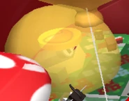 A golden bubble in a field.