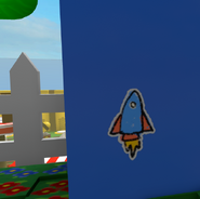 A Launching Rocket Sticker hidden behind the Honey Bee Gate.