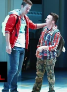Jake with his hand on Rich’s shoulder