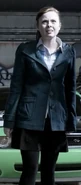 Gwen in a pale blue coat in Alien Swarm