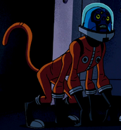 Simian in an orange spacesuit in Birds of a Feather