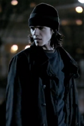 Kevin in a dark grey jacket and beanie in Alien Swarm