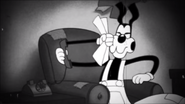 Bendy showing the poster to Boris through phone