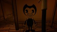Bendy's cutout leaning against the wall from the toy storage's entrance on Level K.
