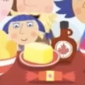 Blueberry next to maple syrup and butter