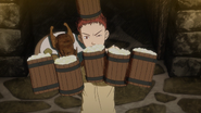 Isidro's initial appearance in the anime, serving a group of bandits in a tavern.