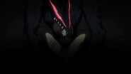 The Beast holding Casca's decapitated head in a hallucination.