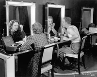 Albert and Grace Brandt applying makeup for their first TV appearance, November 1936.