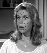 Green spots appear on Samantha.