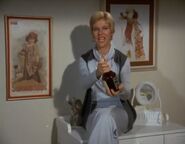 Minerva brings wine to encourage a romantic evening.