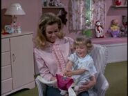 Samantha distracts Tabatha so Darrin can go to work.