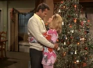 Darrin and Samantha share a Christmas embrace.