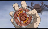 Another picture of Tetsuya holding his Beyblade Mad Gasher CH120FS in his hand.