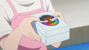 Hina holding a Feather Phoenix Box from Yggdrasil Inc.