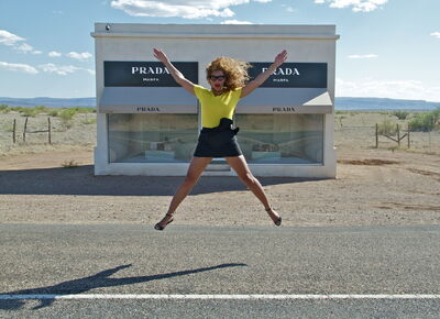 Beyoncé poses in front of Prada Marfa