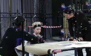 Caroline Wolfson filming a motion capture scene with Kadeem Hardison and Willem Dafoe