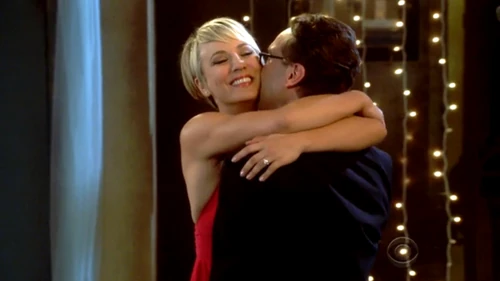 Leonard and Penny happy at the prom together.