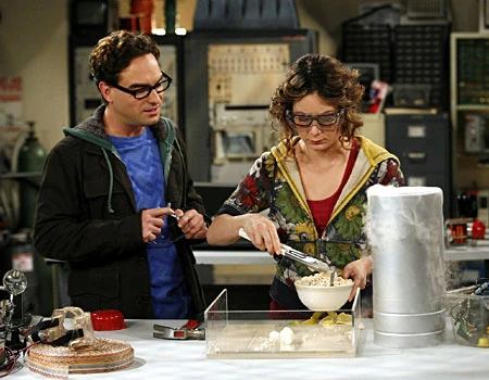 Making sliced banana for her cereal.