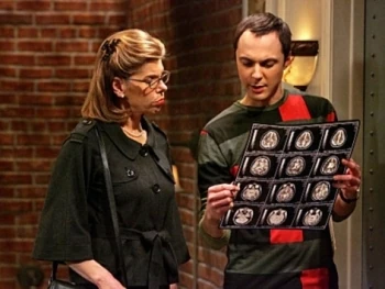 Examining Sheldon's brain.