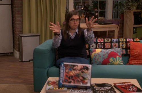 Amy throws away the comic book.