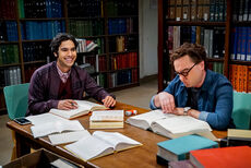 Raj and Leonard working in the library.