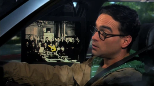 Playing games with Leonard while driving.