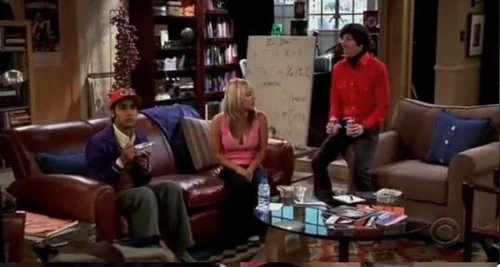 Penny talking with Howard and Raj.