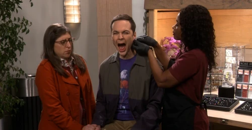 Getting his ear pierced.