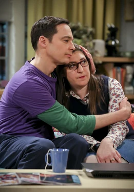 Sheldon holding Amy.
