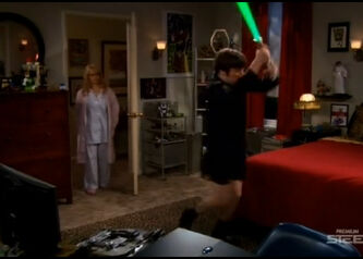 Howard plays with laser sword