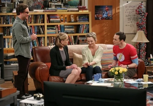 Penny showing off her engagement ring.