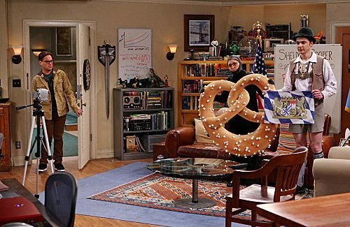 Sheldon and Amy dress up as they record Sheldon's Internet show.