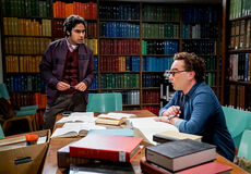Raj helping Leonard with the notations.