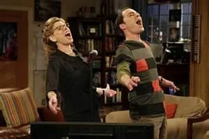 Beverly and Sheldon singing together.