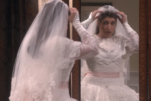 Amy fixing her veil.