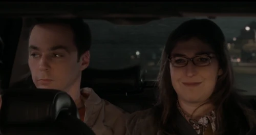 Amy smiling that they take longer to have sex than Howardette.