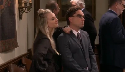 Leonard and Penny at the reception.