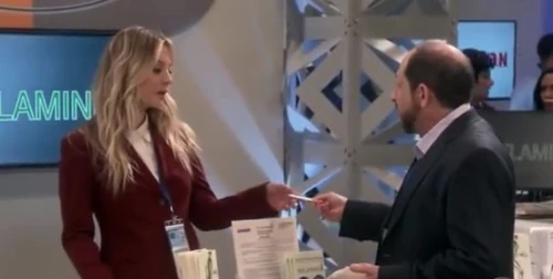 Taking Danny's card.