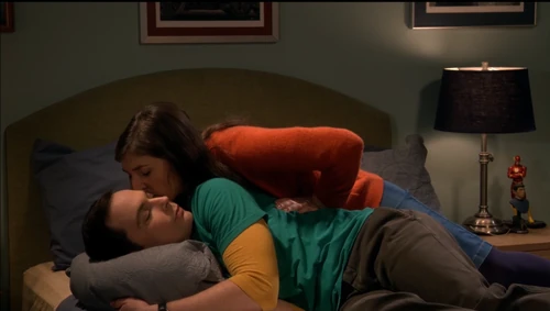 Amy cheers Sheldon up by kissing him