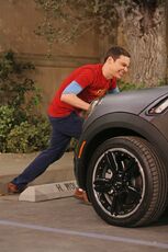 Sheldon trying to move Howard's car parked in "his" space.