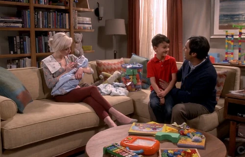 Raj's family with Claire.