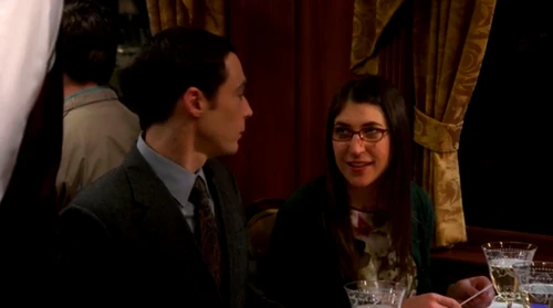 Amy smiling at their Valentine's dinner.